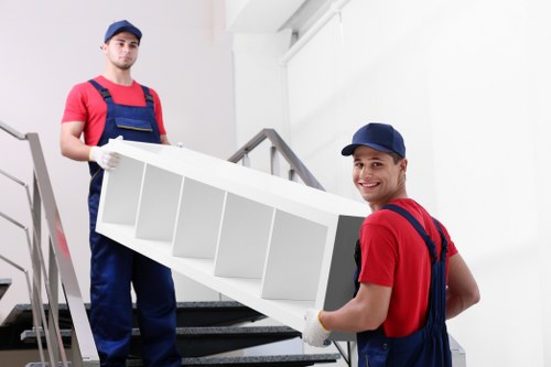 Professional movers handling a household relocation