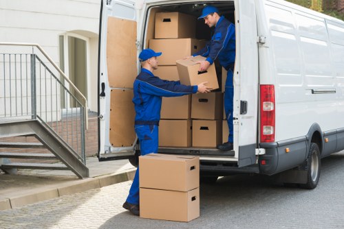Professional team loading a removal truck in Storage Pimlico