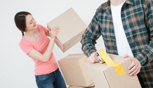 Professional team removing furniture from storage unit